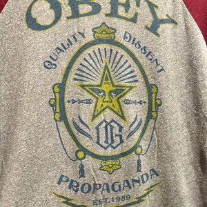 Obey Gray and blue baseball shirt.